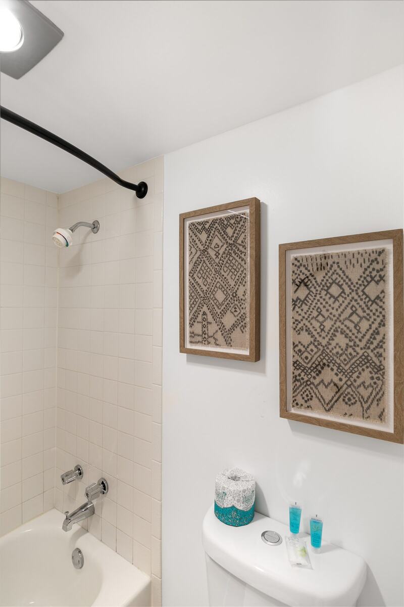 Bathroom with tub and shower